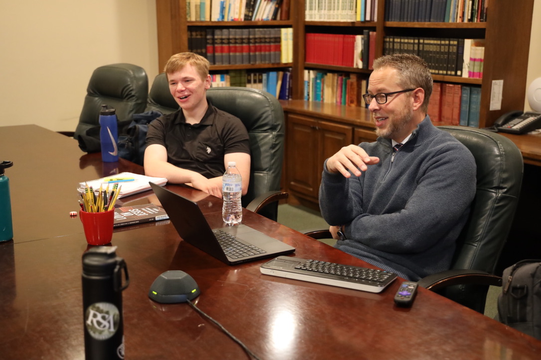 Faculty mentoring a student over video call